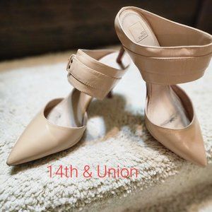 Cream closed toe dress shoe with over the ankle strap